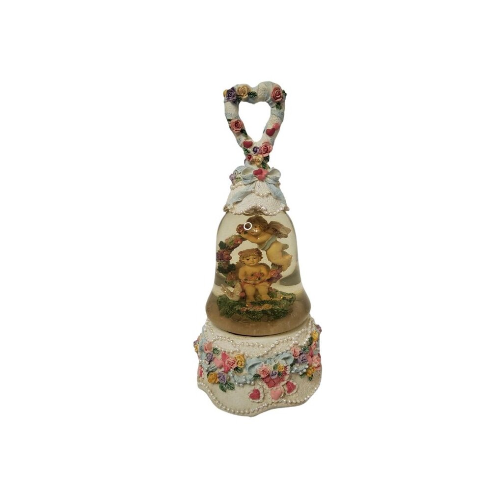 vintage 1980's resin music box, figural cherubs inside a bell shaped floral snow